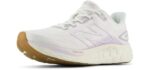 New Balance Women's Fresh Foam 680 V8 Running Shoe, Sea Salt/Taro, 8 Wide